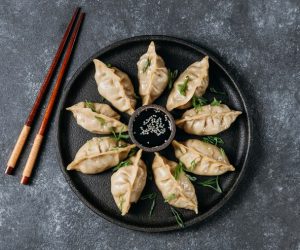 flat-lay-japanese-dumplings-assortment_23-2148809859