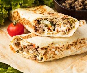 high-angle-delicious-kebab-with-meat-salad_23-2148685543