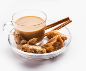 jaggery-tea-or-gur-ki-chai-with-ingredients-like-gud-ginger-or-adrak-green-cardamom-and-cinnamon-free-photo
